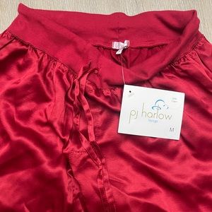 PJ Harlow PJ capri pants. Size medium. Never warm. Red in color